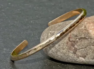 14k Gold hammered sleek cuff bracelet with mirror finish and dainty styling