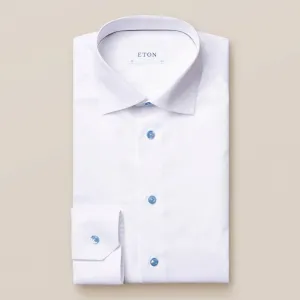White Shirt with Blue Buttons