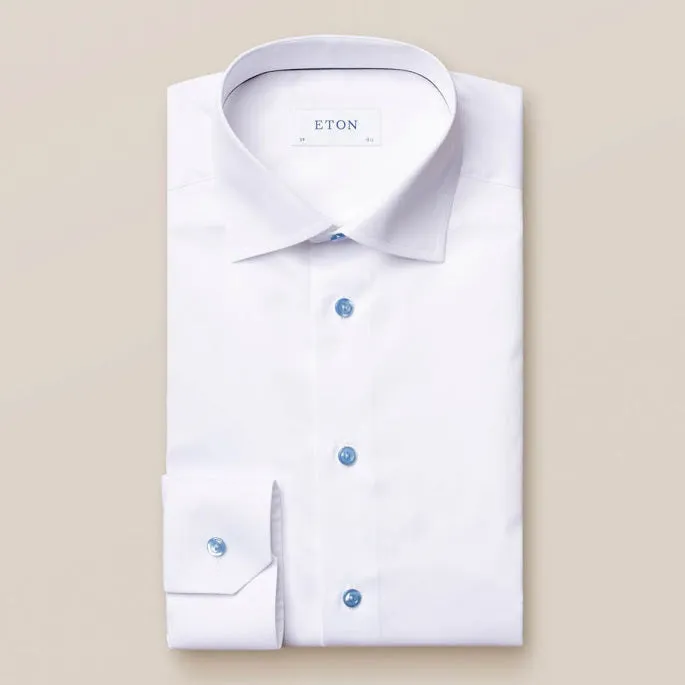 White Shirt with Blue Buttons